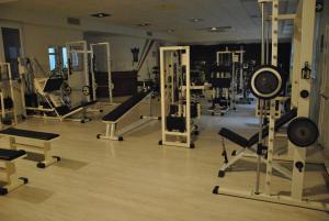 a gym with lots of equipment in a room at Park Hotel Italia in Tezze sul Brenta