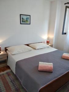 Posteľ alebo postele v izbe v ubytovaní Seaside holiday house Mali Iz (Iz) - 17536