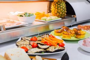 Comida no cama e café (B&B) ou em algum lugar perto