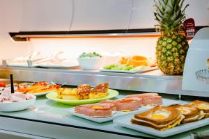 Comida no cama e café (B&B) ou em algum lugar perto