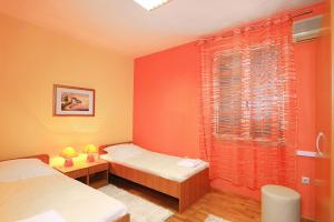 Postel nebo postele na pokoji v ubytování Apartment Split 17386a