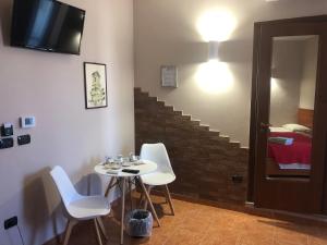Posezení v ubytování Aurora Rooms