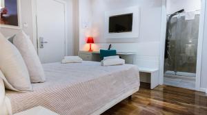 Cama ou camas em um quarto em B&B Vanity