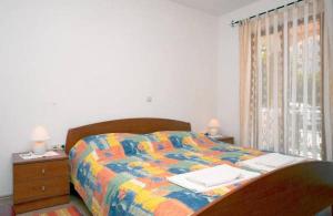 เตียงในห้องที่ Apartments with WiFi Vrsar, Porec - 17473