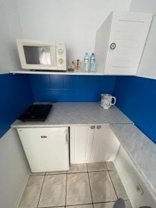 Kuchyňa alebo kuchynka v ubytovaní Apartamenty Konopnicka