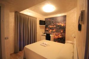 Letto o letti in una camera di I Rocchi Hotel
