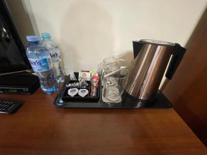 Príslušenstvo na prípravu kávy alebo čaju v ubytovaní Apartamenty Konopnicka