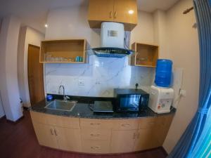 Cucina o angolo cottura di Hotel Mega & Apartment