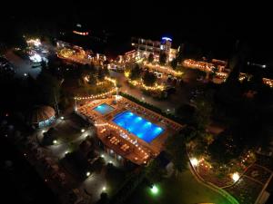 an overhead view of a city at night at Hotel Kormoran Resort & SPA in Sulęcin