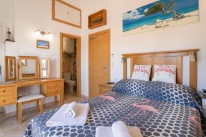 Postel nebo postele na pokoji v ubytování Heads 2 Holiday Homes Townhouse + 18 fotografií