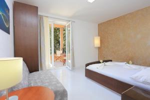 Fotografia z galérie ubytovania Apartments with a parking space Makarska - 17047 v destinácii Makarska