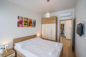Posteľ alebo postele v izbe v ubytovaní Silver Lodge Siófok