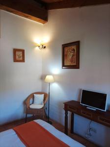 Postel nebo postele na pokoji v ubytování La Casa de los Gatos