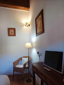 TV a/nebo společenská místnost v ubytování La Casa de los Gatos
