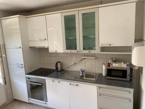 Kuchyň nebo kuchyňský kout v ubytování Bus Station Hostel