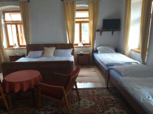 Postel nebo postele na pokoji v ubytování Apartmán Chrpa
