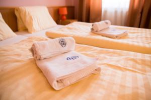 Uma cama ou camas num quarto em Hotel Clavis