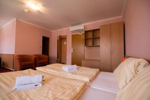 Uma cama ou camas num quarto em Hotel Clavis