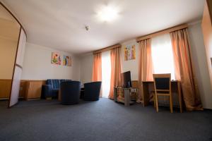 Uma área de estar em Hotel Clavis