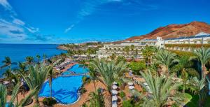 an aerial view of the resort and the ocean at Hipotels Natura Palace Adults Only in Playa Blanca