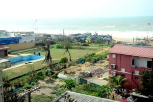 a view of the ocean from a building at LN BEACH Homestay in Puri