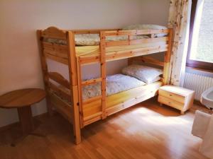 Voodi või voodid majutusasutuse Hotel Gemmi toas