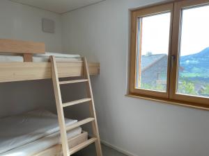 Postel nebo postele na pokoji v ubytování Bregenzerwaldblick