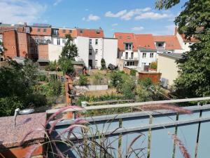 a view of a city from the roof of a building at Townhouse Altstadt Wismar Upper Apartment mit zwei Terrassen in Wismar