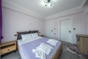 Postel nebo postele na pokoji v ubytování Villa Ada