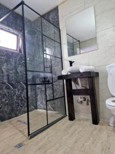 Koupelna v ubytování Complex Dealu' Frumos + 37 fotografií