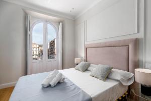 Posteľ alebo postele v izbe v ubytovaní Apartamento Plaza de la Merced 4 habitaciones