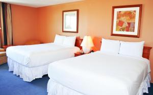 Ένα ή περισσότερα κρεβάτια σε δωμάτιο στο Laughlin River Lodge