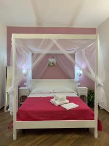 Postel nebo postele na pokoji v ubytování All’Anoneto B&B