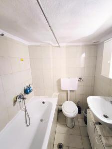 A bathroom at 3BR Spacious City Center