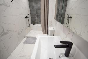 Koupelna v ubytování Sea & City LUXURY SUITE