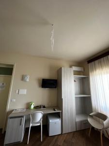 TV a/nebo společenská místnost v ubytování All’Anoneto B&B