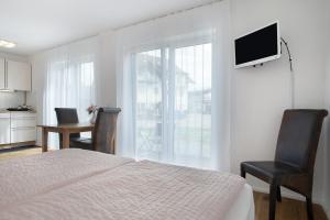 TV a/nebo společenská místnost v ubytování Apartment Landzeit