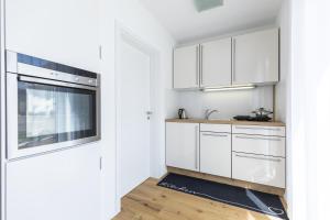 Kuchyň nebo kuchyňský kout v ubytování Apartment Landzeit