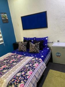 Katil atau katil-katil dalam bilik di NUMBERS FLIPPERS SERVICES Apartment