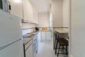 Η κουζίνα ή μικρή κουζίνα στο Apartament Rosa