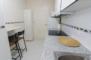 Η κουζίνα ή μικρή κουζίνα στο Apartament Rosa
