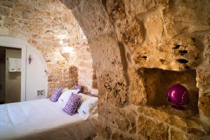 Postel nebo postele na pokoji v ubytování Casa Tonini + 72 fotografií