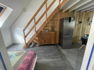 Kuchyňa alebo kuchynka v ubytovaní F3 Duplex "O Meublé de Pithiviers" 2 chambres 8 personnes