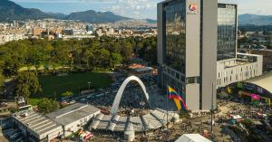 an aerial view of a city with a rainbow arch at Hotel Radel Superior in Bogotá