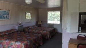 Ένα ή περισσότερα κρεβάτια σε δωμάτιο στο Twin Lakes Inn