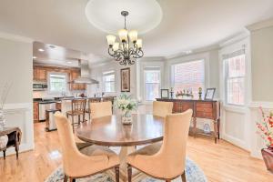 a kitchen and dining room with a table and chairs at Spacious DC Family Home 6 Mi to Capitol Hill in Washington, D.C.