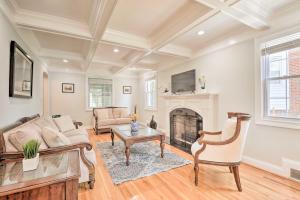 a living room with a couch and a fireplace at Spacious DC Family Home 6 Mi to Capitol Hill in Washington, D.C.