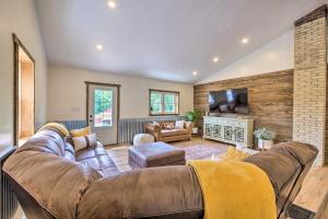 a large living room with a couch and a tv at Hidden Hollow Family Home with Mod Interior! in Dundee