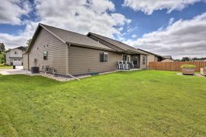 a house with a lawn in front of it at Rapid City Home with Patio Less Than 5 Mi to Downtown! in Rapid City