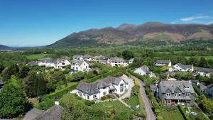 an aerial view of a house in the mountains at Dalegarth Guesthouse Portinscale in Keswick